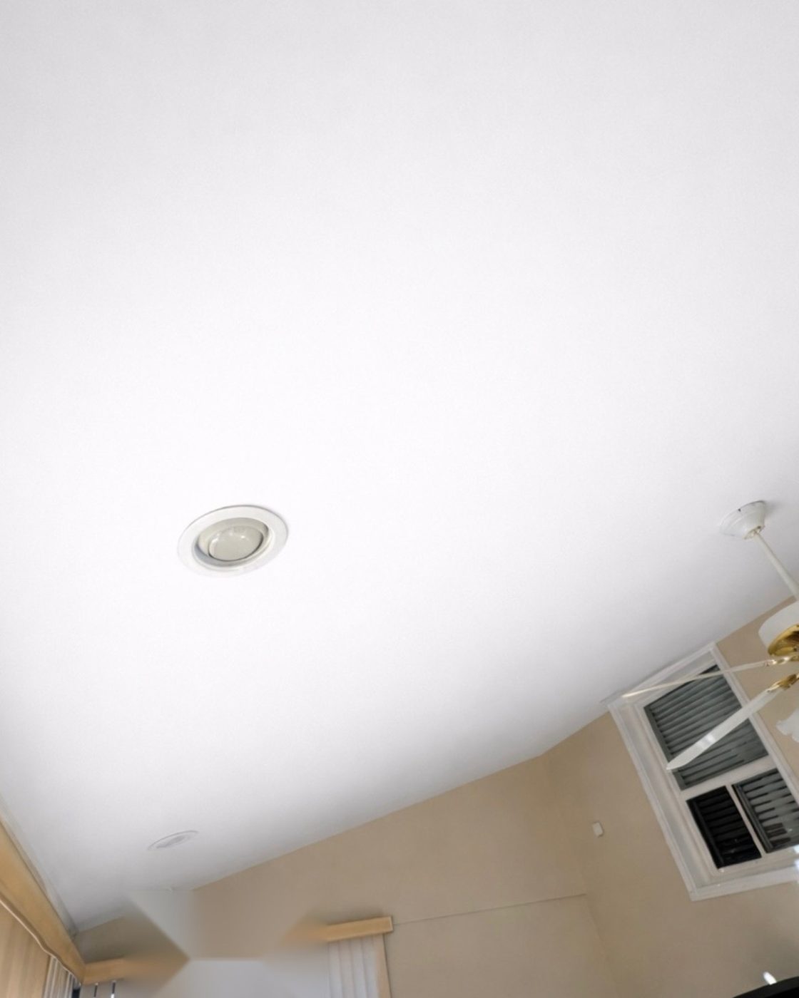 Ceiling after drywall repair, smooth seamless finish