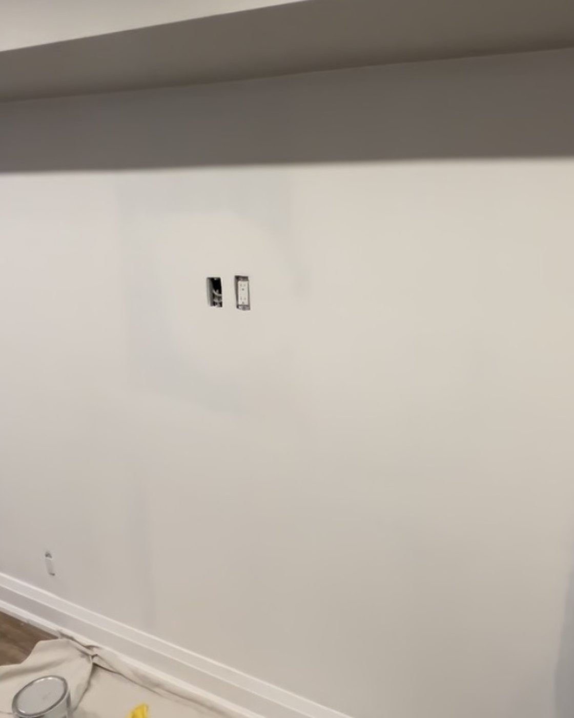 Wall after drywall patch, seamless painted repair
